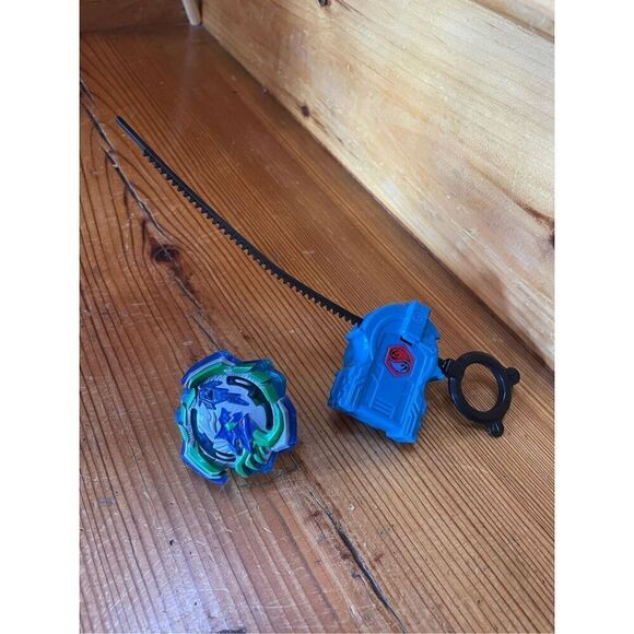 BEYBLADE BURST HASBRO OGRE COLLECTIBLE TOY WITH RANDOM LAUNCHER - Picture 1 of 4